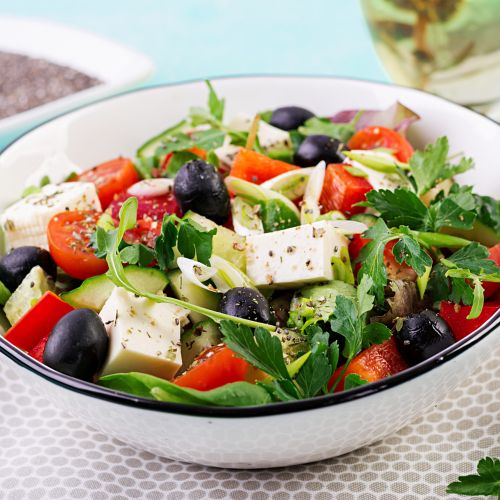greek-salad-with-cucumber-tomato-sweet-pepper-lettuce-green-onion-feta-cheese-olives-with-olive-oil-healthy-food
