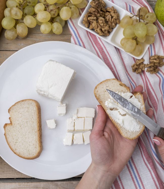 top-view-variety-grapes-with-walnuts-cheese