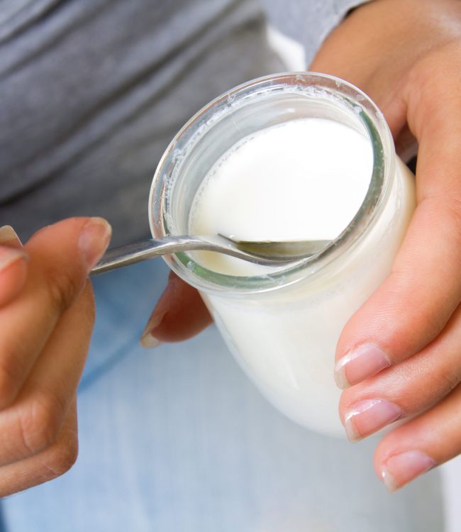 close-up-female-eating-yogurt