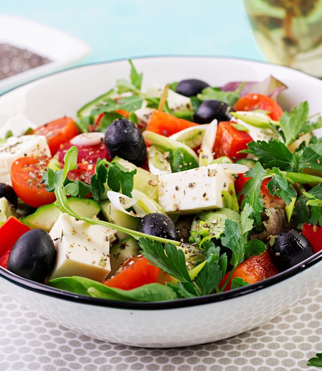 greek-salad-with-cucumber-tomato-sweet-pepper-lettuce-green-onion-feta-cheese-olives-with-olive-oil-healthy-food