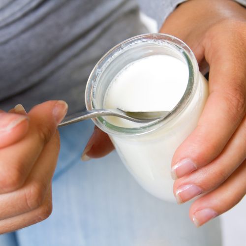 close-up-female-eating-yogurt
